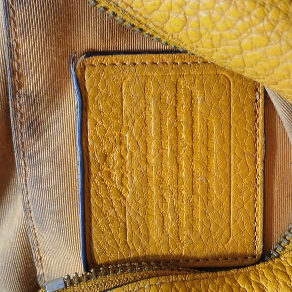 Coach Carrie Orange Pebbked Leather Handbag - Picture 10 of 13